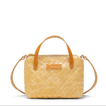 Yellow woven handbag with brown leather straps on a white background
