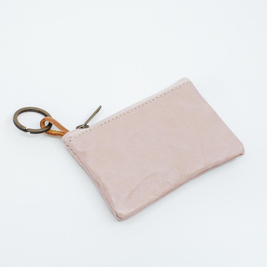 A dusky pink metallic washable paper small pouch is shown with a keyring attachment and zip closure.