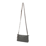 A grey washable paper small zip top handbag is shown with a long tan washable paper strap.