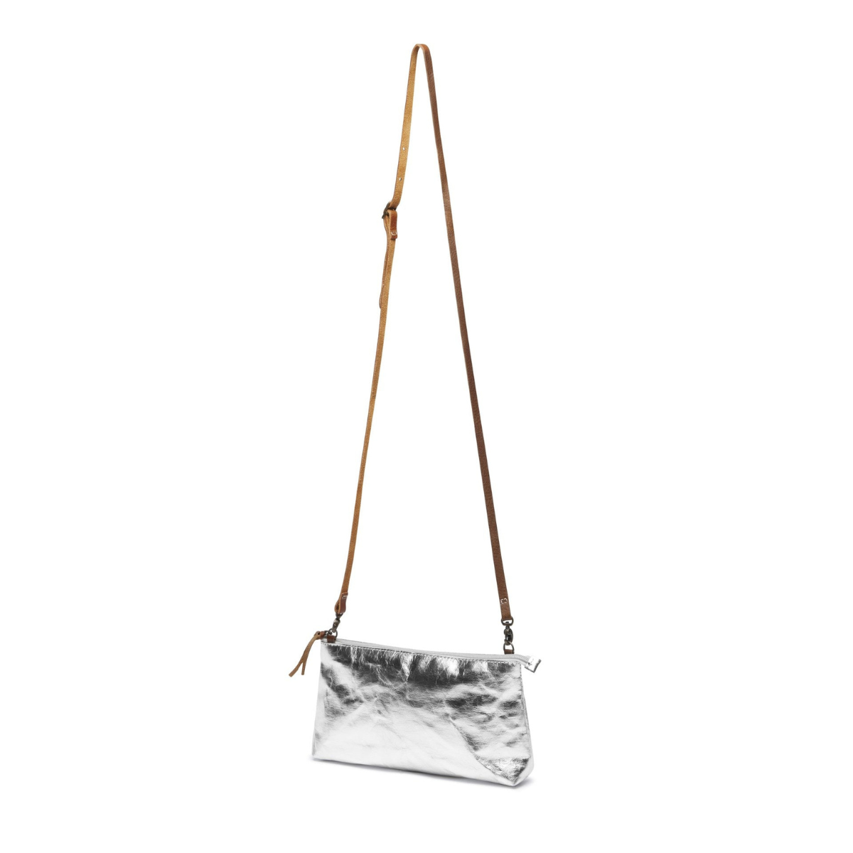 A silver metallic washable paper small zip top handbag is shown with a long brown washable paper strap.