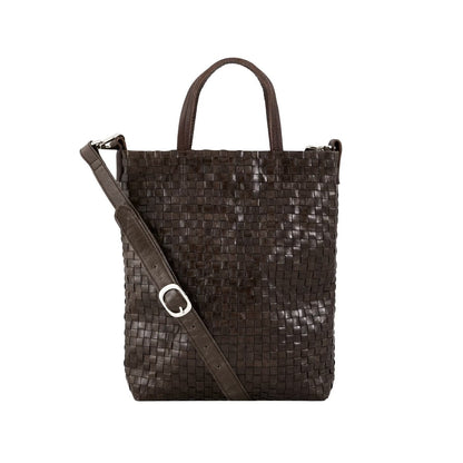 A woven washable paper tote bag is shown from the front angle. It features two top handles and a long adjustable shoulder strap. It is chocolate brown in colour.