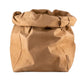 A washable paper bag is shown. The bag is rolled down at the top and features a UASHMAMA logo label on the bottom left corner. The bag pictured is the gigantic size in tan.