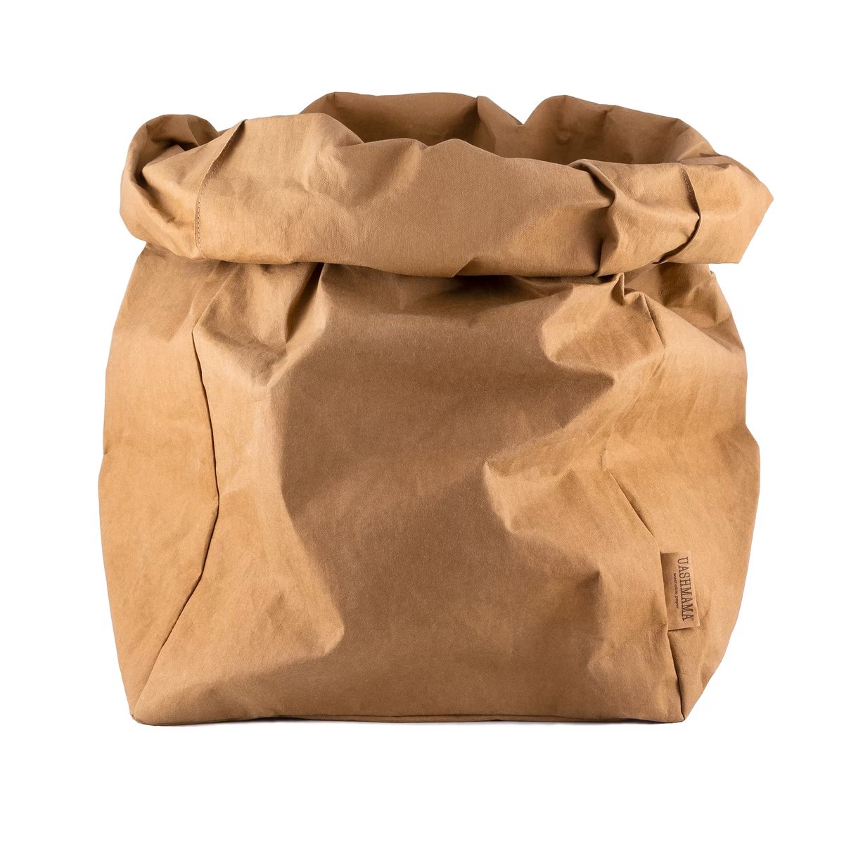 A washable paper bag is shown. The bag is rolled down at the top and features a UASHMAMA logo label on the bottom left corner. The bag pictured is the gigantic size in tan.