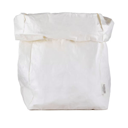 A washable paper bag is shown. The bag is rolled down at the top and features a UASHMAMA logo label on the bottom left corner. The bag pictured is the gigantic size in white.