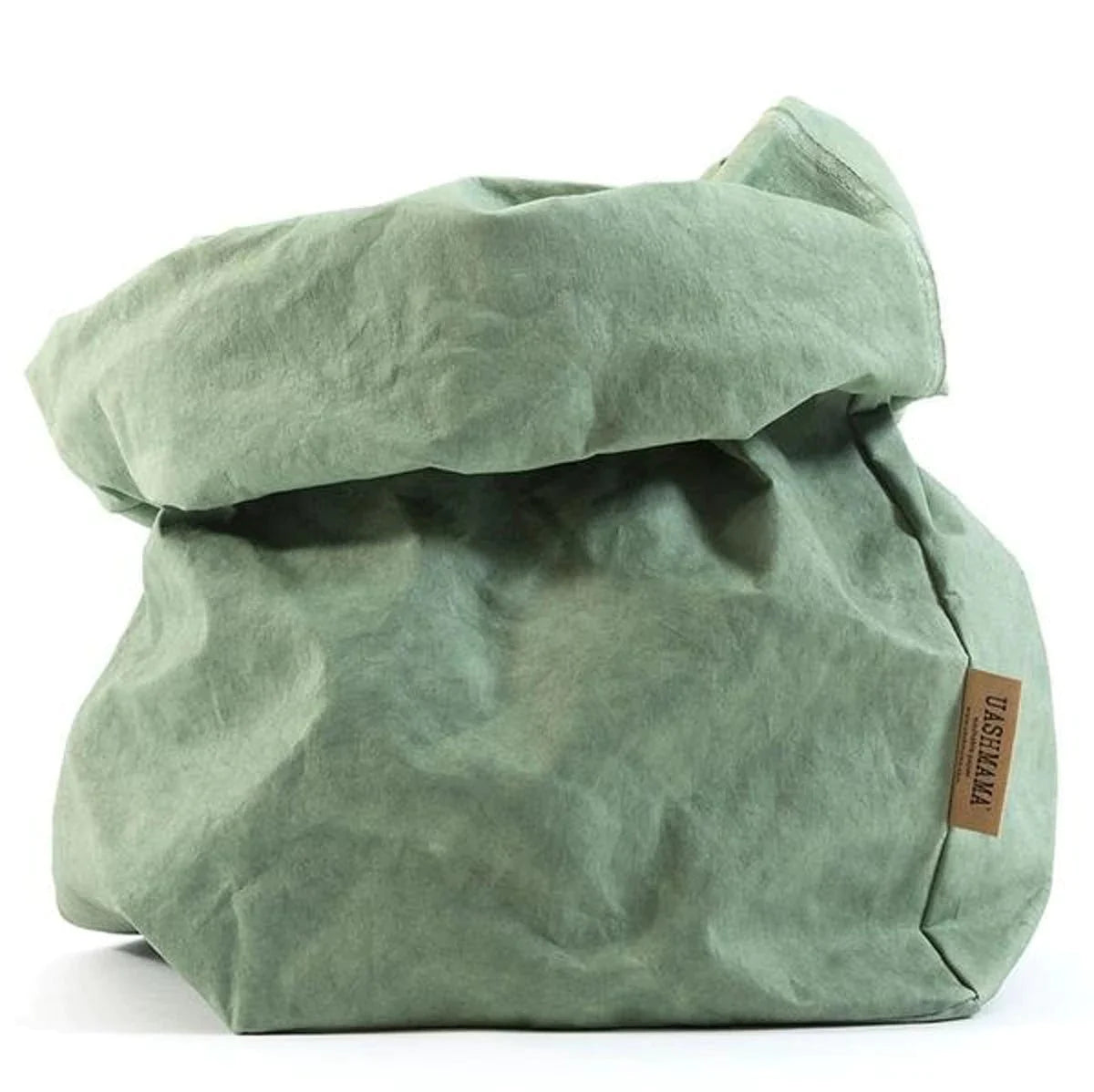 A washable paper bag is shown. The bag is rolled down at the top and features a UASHMAMA logo label on the bottom left corner. The bag pictured is the extra extra large size in green.