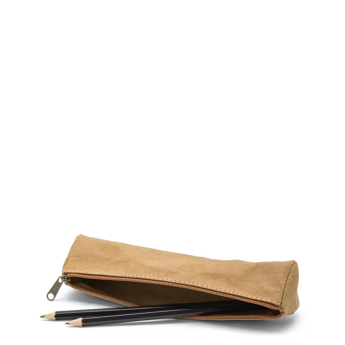 A washable paper pencil case is shown on its side with two pencils spilling out. The pencil case is tan in colour and has a metal zip closure.