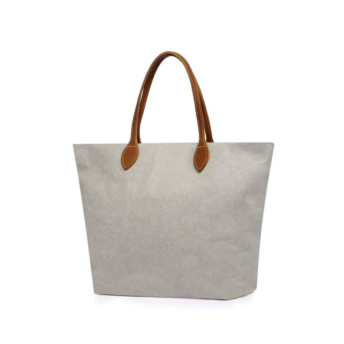 A large washable paper tote is shown. It has two long tan leather handles. The bag shown is pale grey with tan handles.