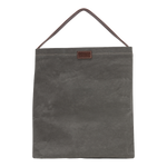 A grey washable paper handbag is shown from the front. It features a singular top handle in chocolate brown, and a brown UASHMAMA logo stamp on the front.