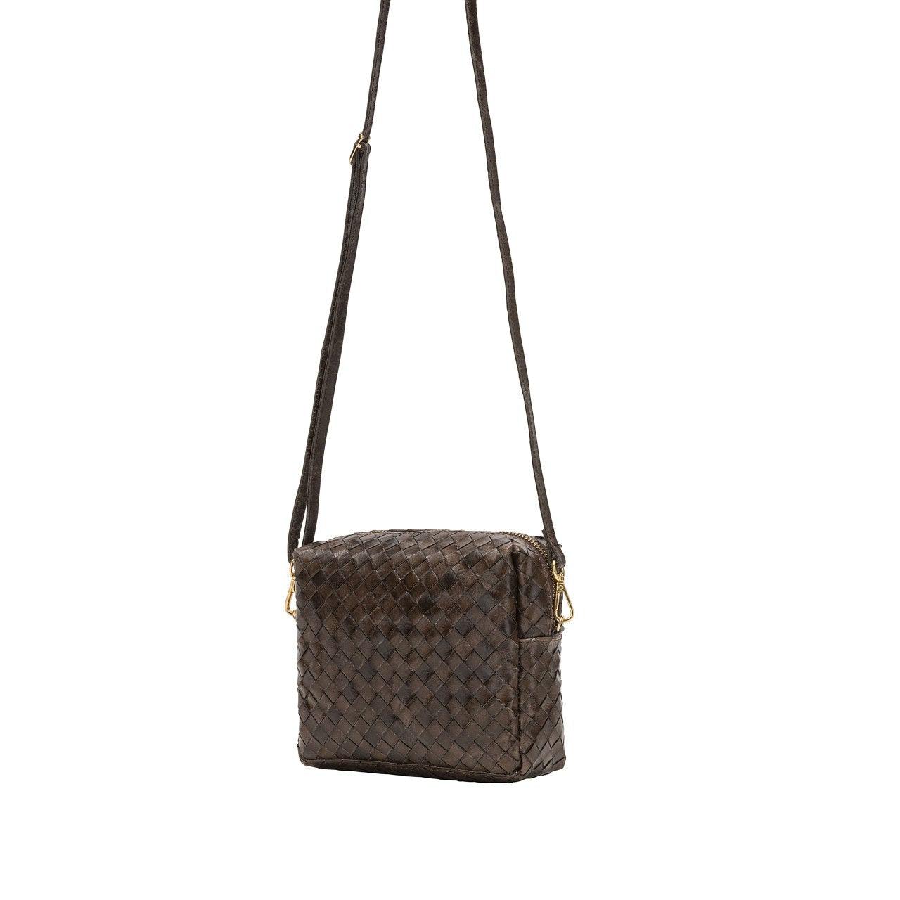 A small woven washable paper handbag is shown with a long washable paper shoulder strap. The bag shown is dark brown.