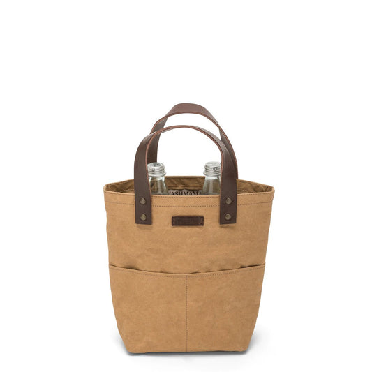 A brown washable paper tote bag with two brown leather handles. The bag contains two tall glass bottles of water.