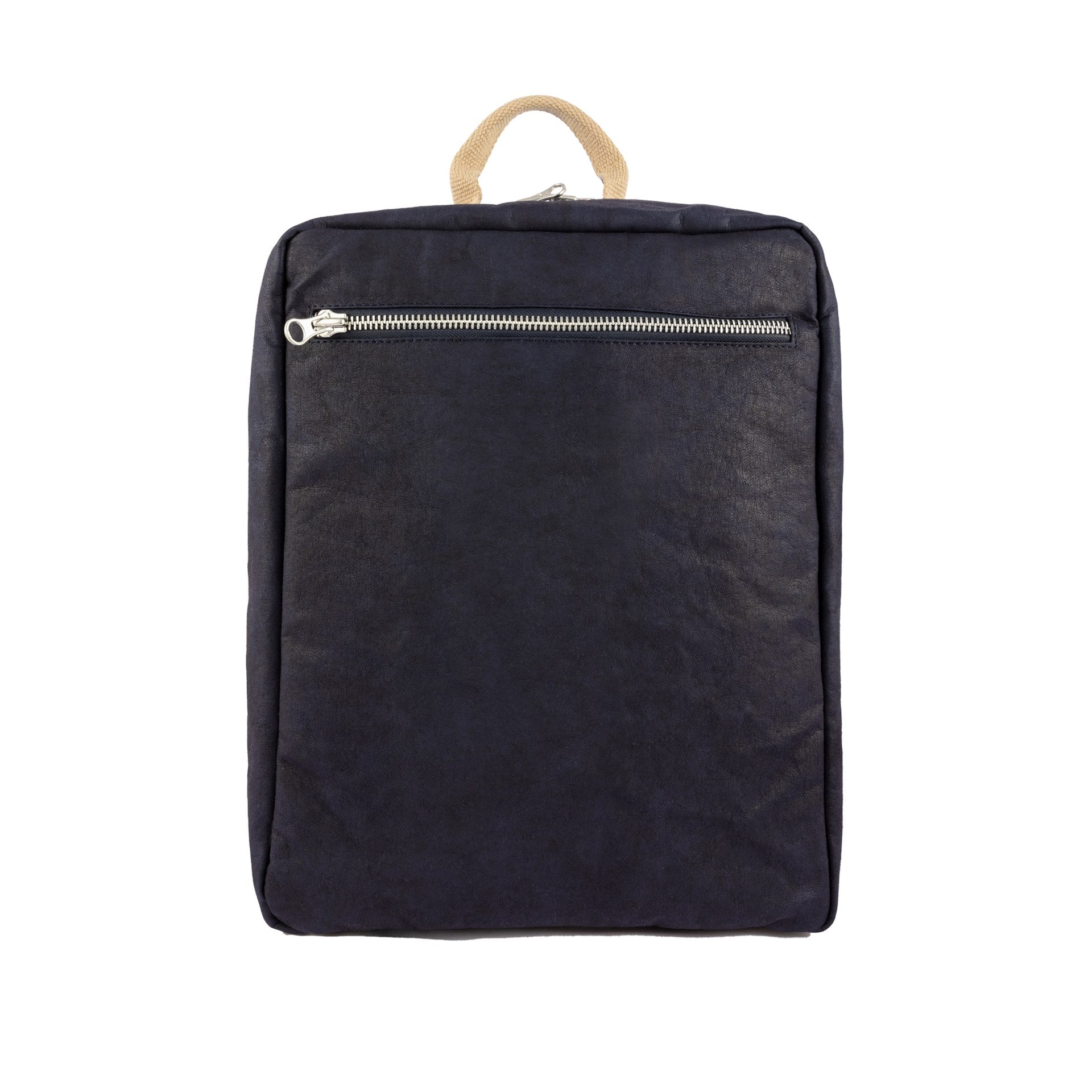 A square washable paper backpack is shown in a black colour. it has one external zip pocket and a top handle.