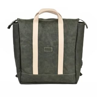 A natural toned dark green washable paper backpack is shown from the front. Square in design, it features a top zip and two cream canvas handles at the front and at the back.