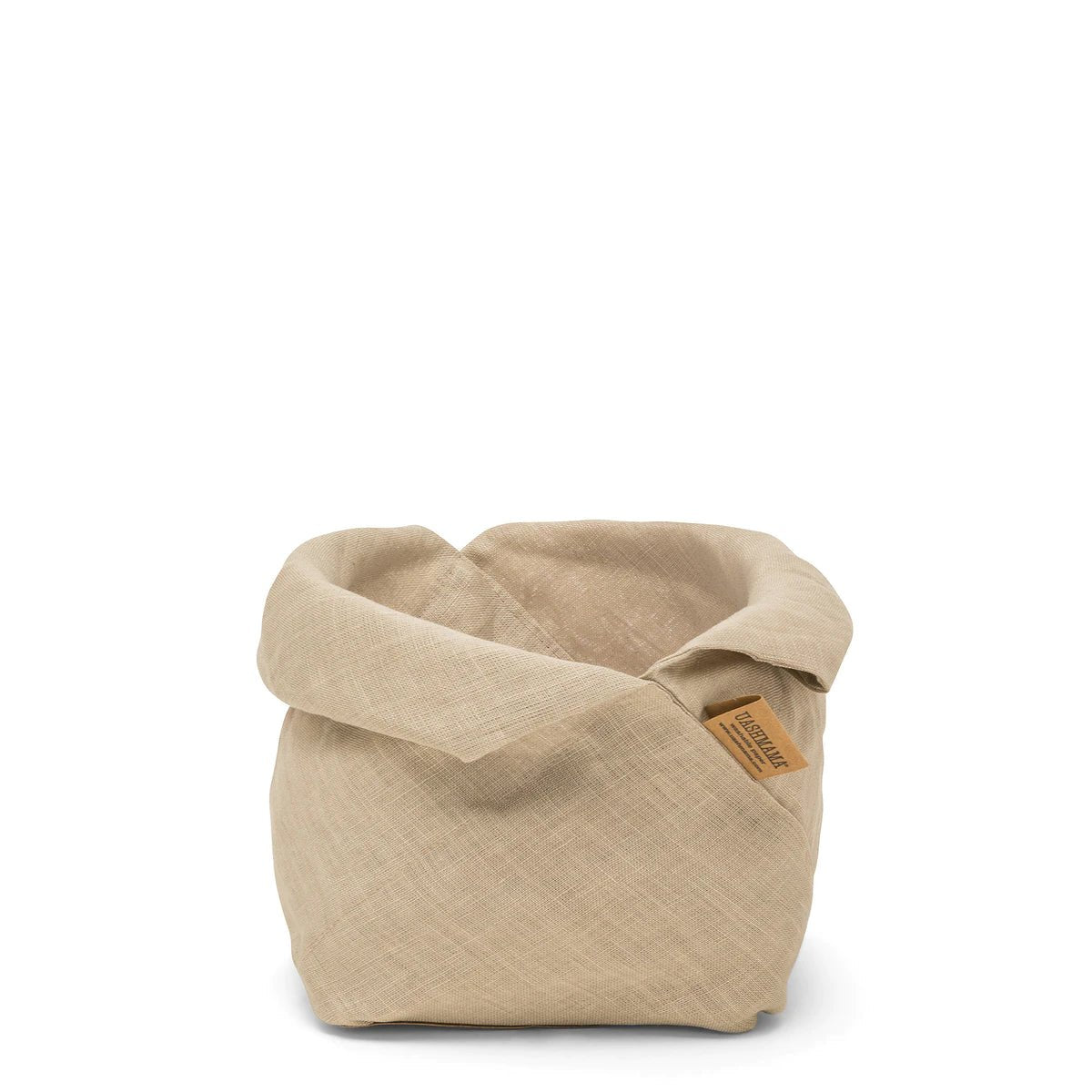 A natural toned linen bread bag is featured from the front, with a brown Uashmama logo tag at right.