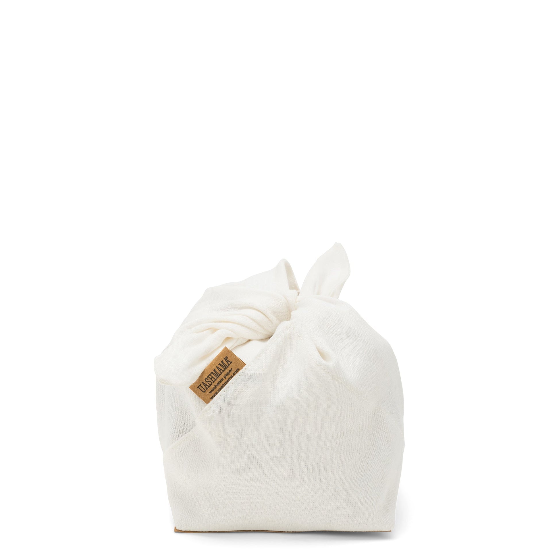 A white linen bread bag is shown with tied handles, and a tan UASHMAMA logo label at the front right side.