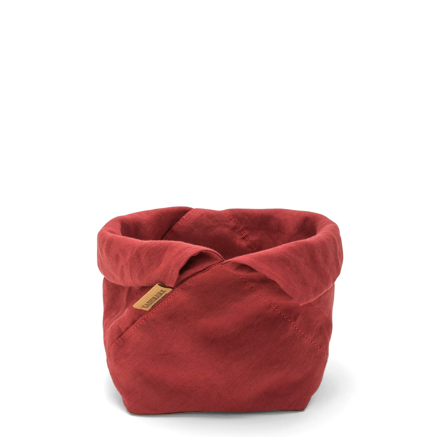 A red linen bread bag is shown with the top rolled down, open. A brown logo UASHMAMA tag features on the front side.