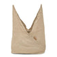 A large natural toned linen bread bag is shown open, with the top fully unfurled, pointing skywards. 