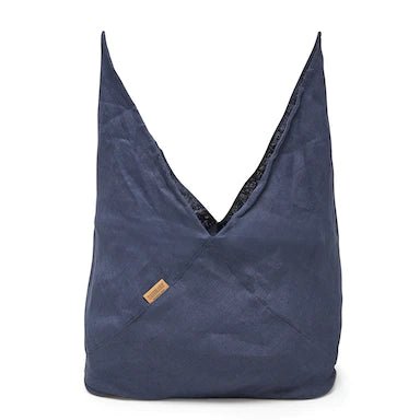 A large navy linen bread bag is shown open, with the top fully unfurled, pointing skywards.