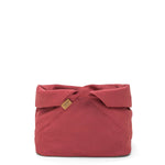 A large red linen bread bag is shown with the top rolled down.