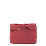 A large red linen bread bag is shown with the top rolled down.