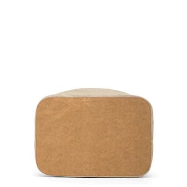 A natural toned linen bread bag is shown from the bottom angle, displaying its tan washable paper base.
