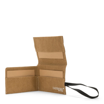 A natural tan coloured washable paper card holder is shown open from the front angle. It features a black elastic side strap and the white UASHMAMA logo stamped on the inside bottom right.