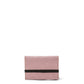 A dusky pink washable paper card holder is shown from the front, with an elastic strap closure in black.