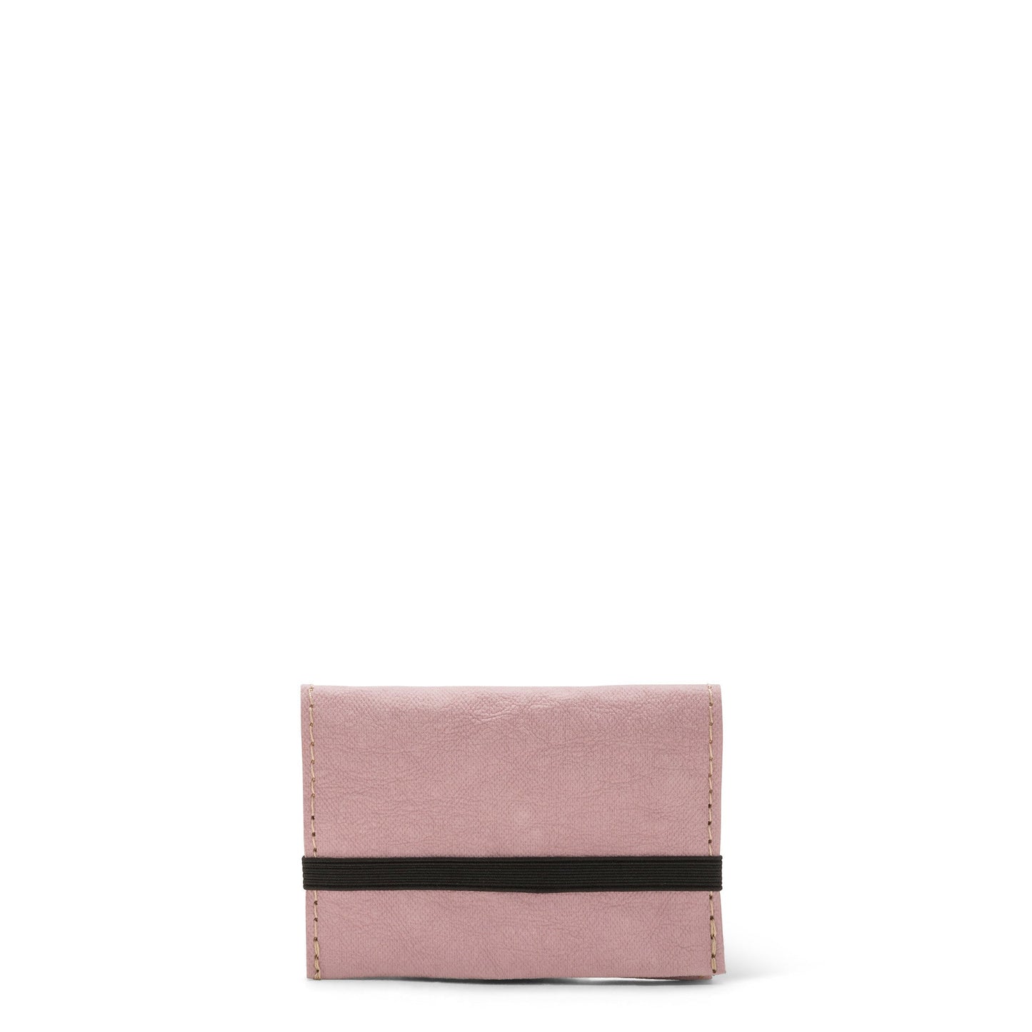 A dusky pink washable paper card holder is shown from the front, with an elastic strap closure in black.