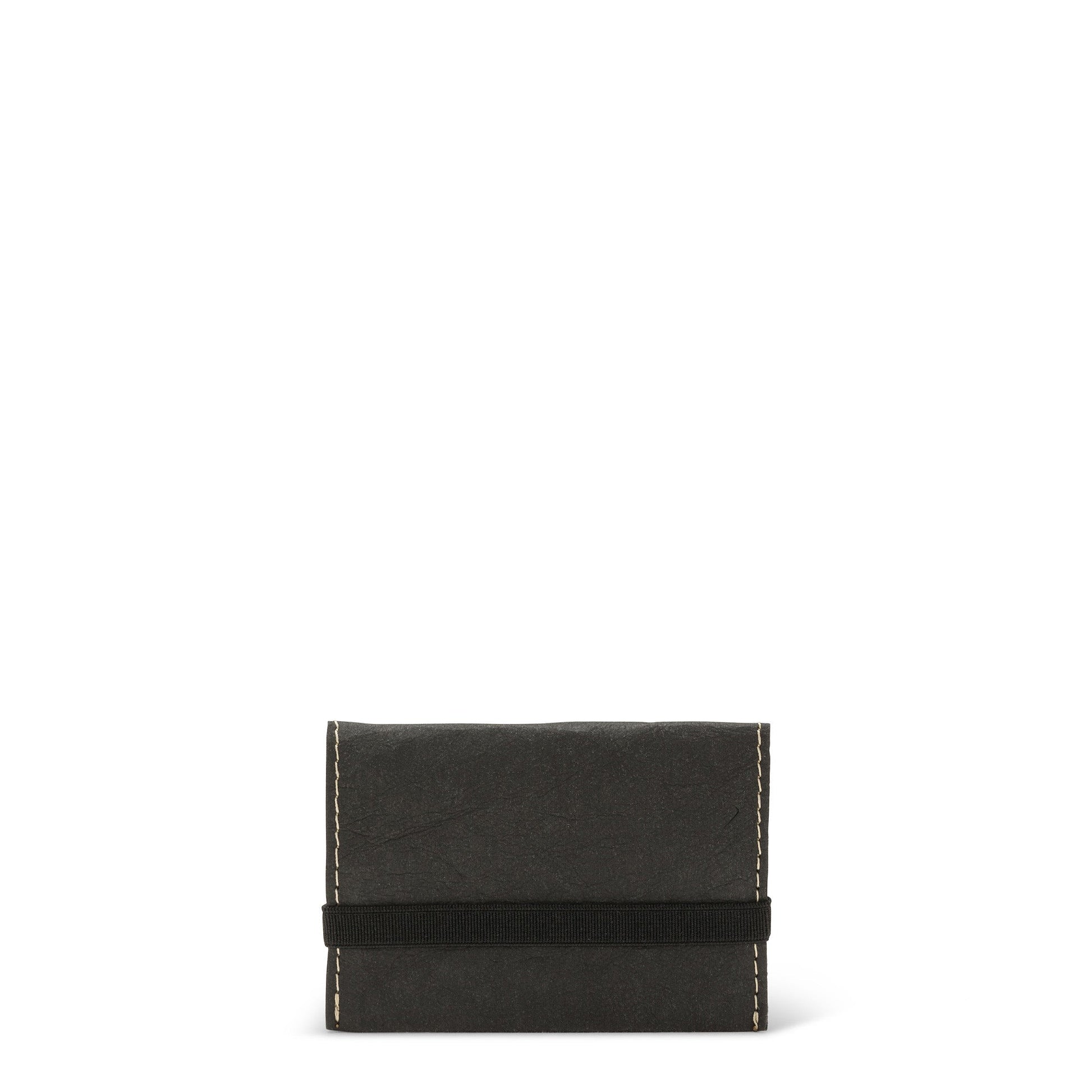 A black washable paper card holder is shown from the front, with an elastic strap closure in black.