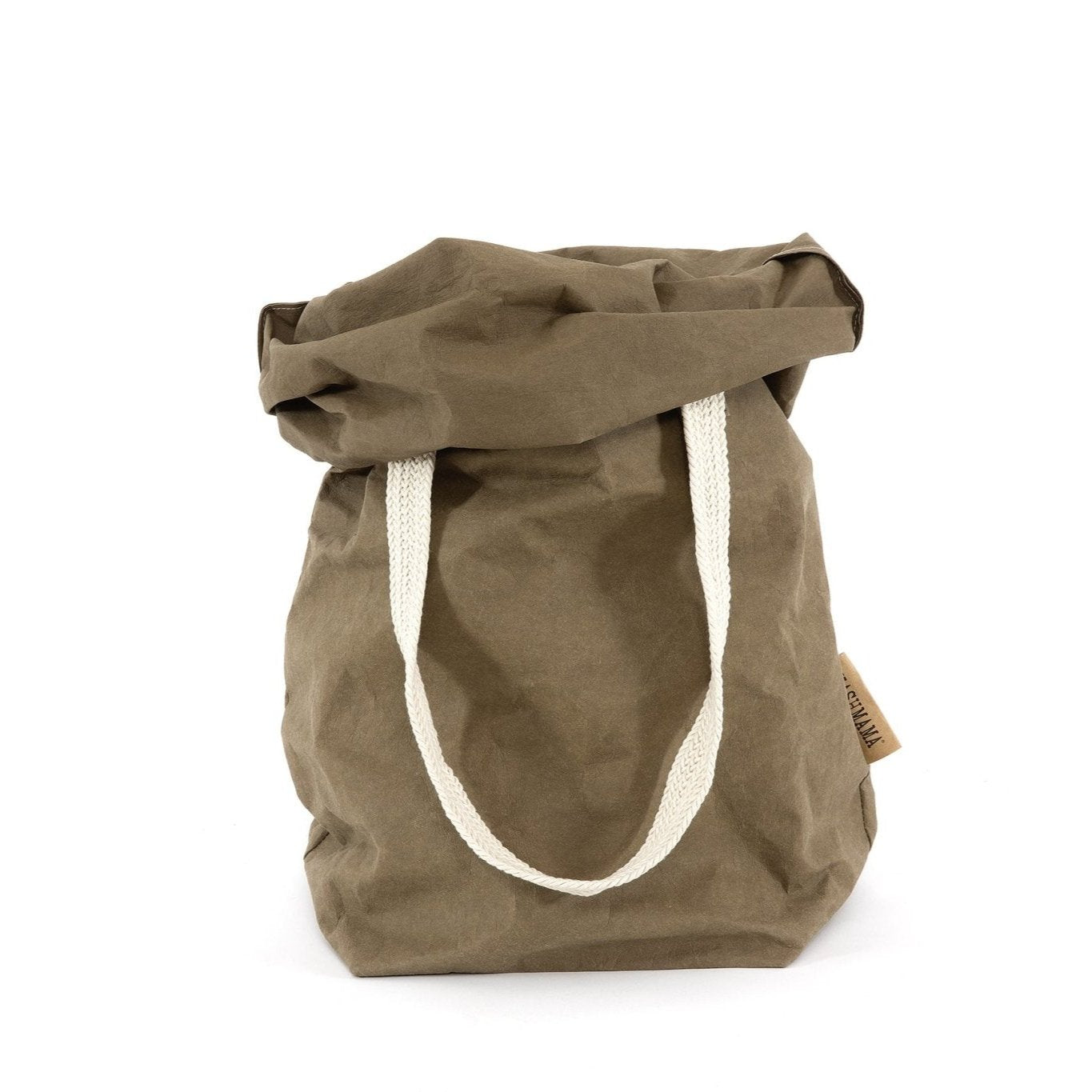 A khaki washable paper bag is shown from the front with the top rolled down. It features two cream cotton straps (one visible in this image) and a natural toned UASHMAMA logo tab at the left hand side.