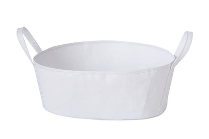 A white washable paper storage basket is shown from the front, with a handle at each side. 