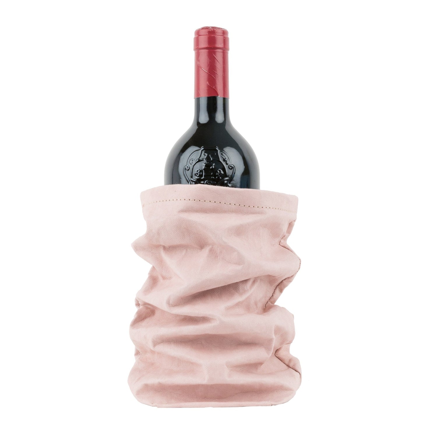 A bottle of red wine is shown inside a pale pink washable paper wine holder.