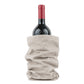 A bottle of red wine is shown inside a grey washable paper wine holder.