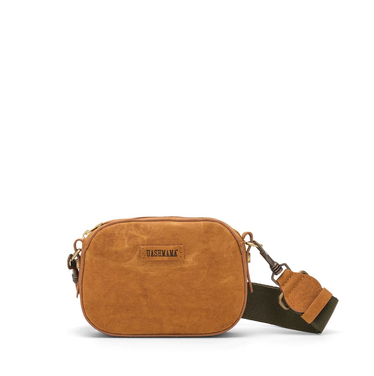 A small washable paper cross-body bag is shown with a front tab bearing the UASHMAMA logo in a small font, embossed in a darker colour. The bag is shown in tan, with a khaki cotton strap with antique brass hardware.