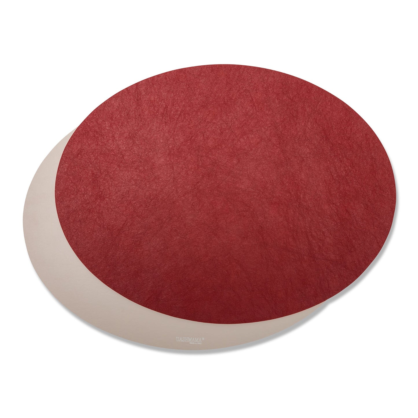 Two oval washable paper placemats are shown on top of each other. The one in the rear is beige and the one on top is red.