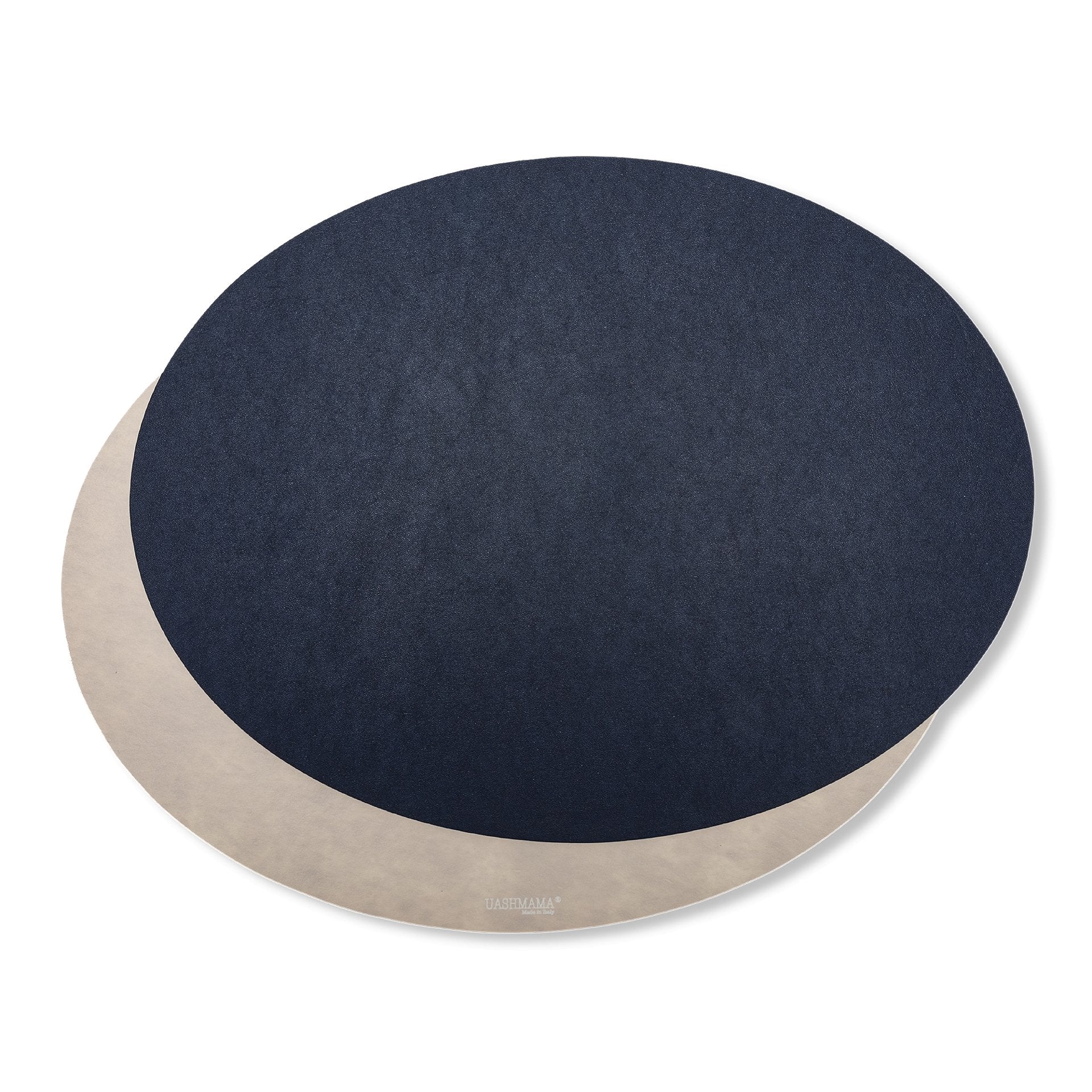 Two oval washable paper placemats are shown on top of each other. The one in the rear is beige and the one on top is navy.