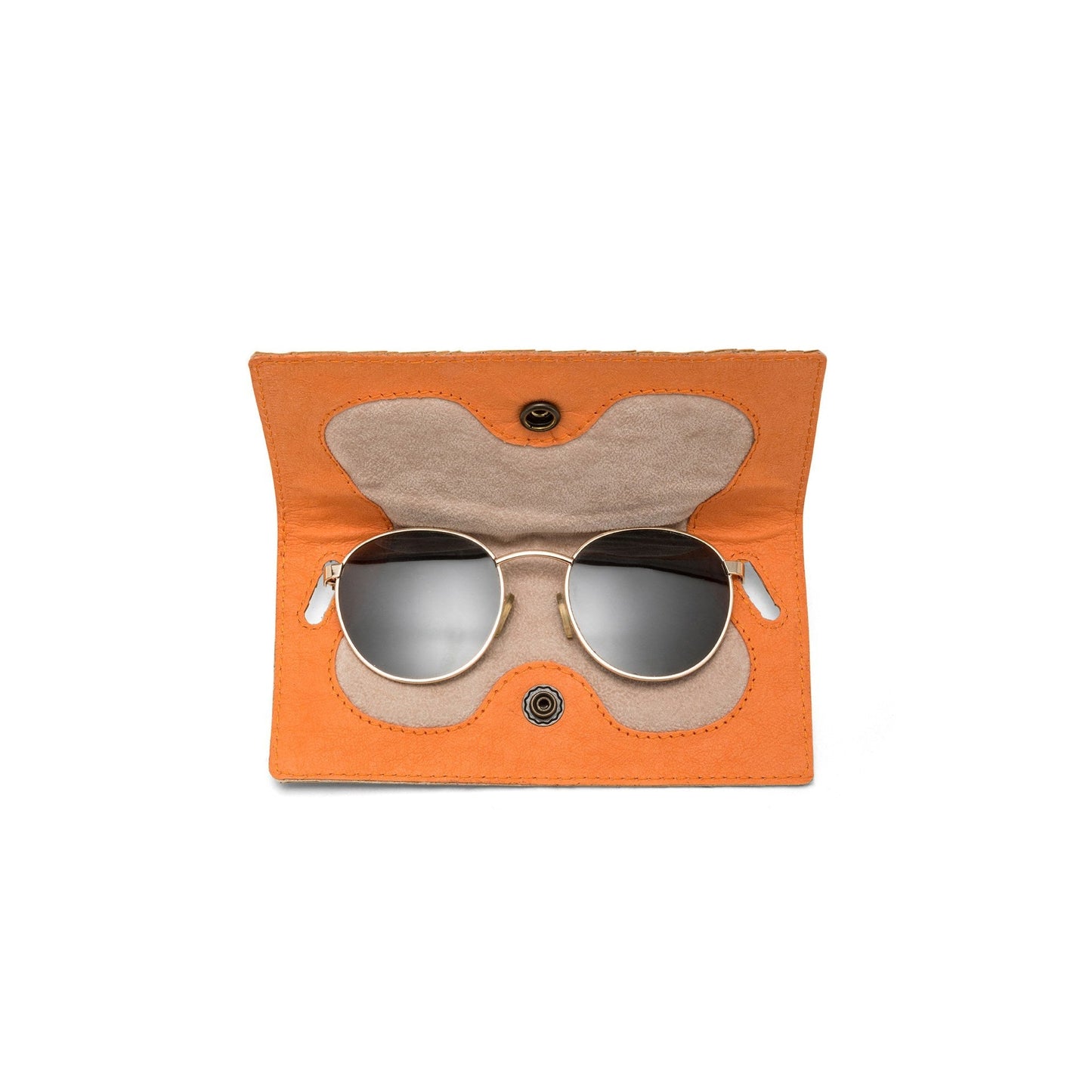 A washable paper glasses case is shown open, with an orange interior and a beige lining in the shape of a pair of glasses. It features a metal stud closure, and a pair of sunglasses sit inside it.