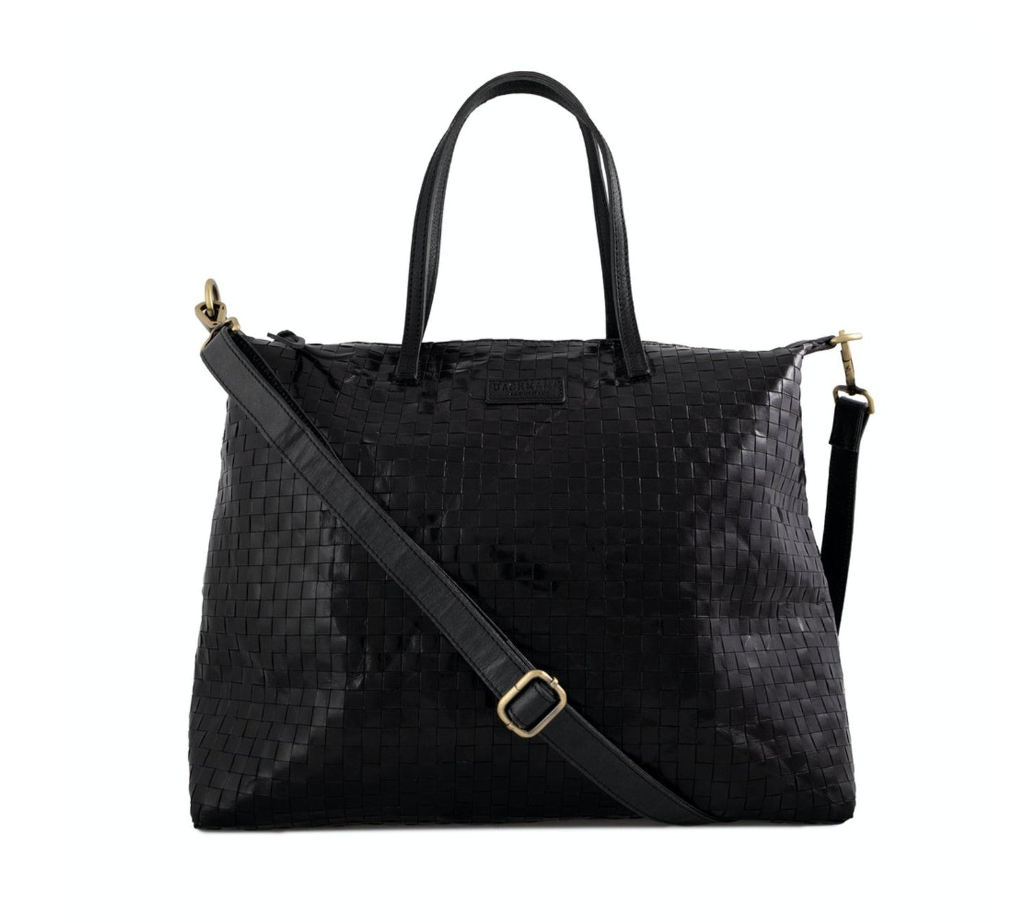 A large black woven washable paper tote is shown from the front angle. It features two top handles and a long washable paper black shoulder strap with brass hardware.