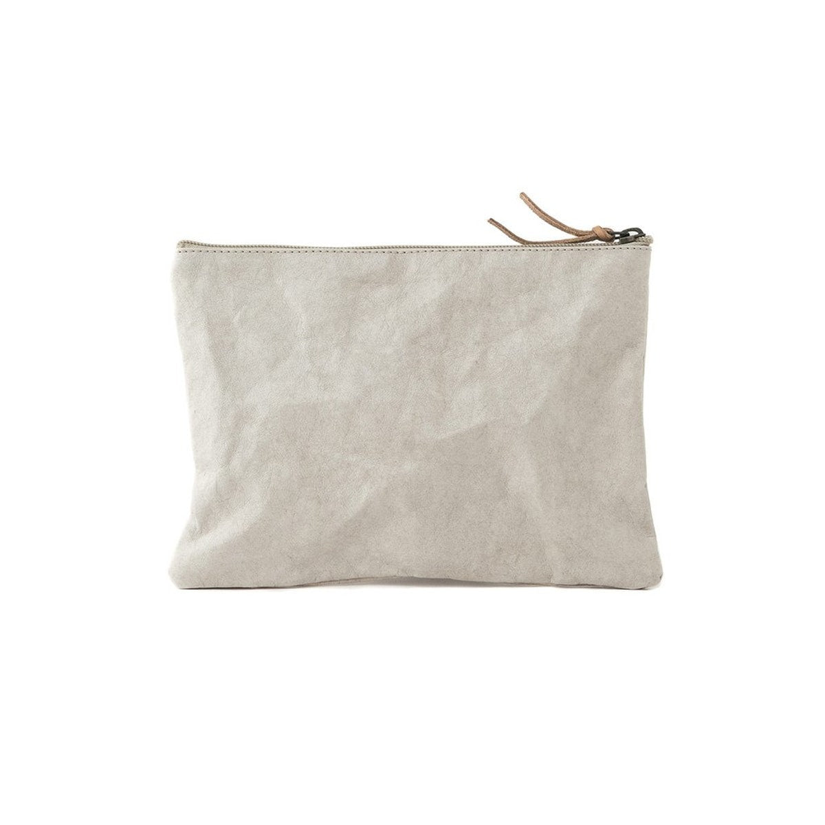 A cream washable paper top zip pouch is shown from the front. It features a brown zip toggle.