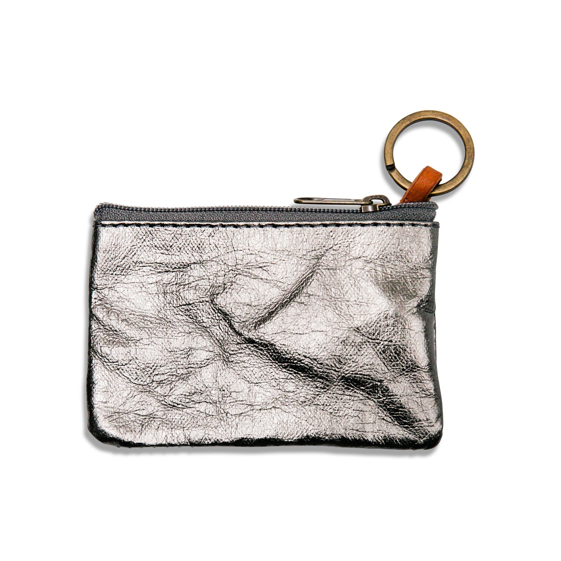 A pewter metallic washable paper small pouch is shown with a keyring attachment and zip closure.