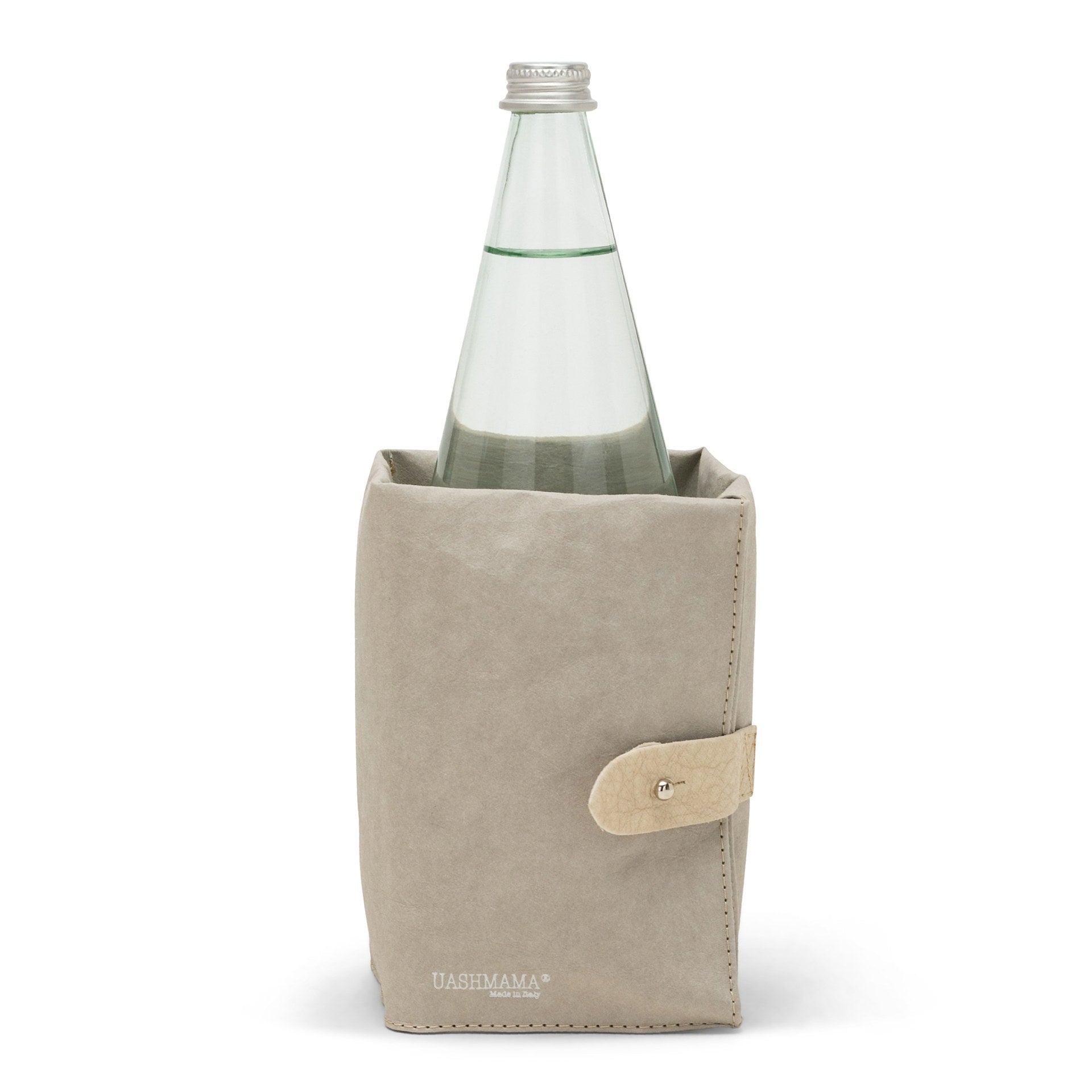 A beige washable paper cooler is shown with a washable paper side tab with silver stud. It contains a glass water bottle.