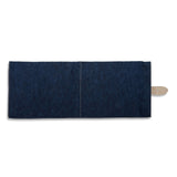 A navy washable paper wine cooler lies open and is photographed from the back.