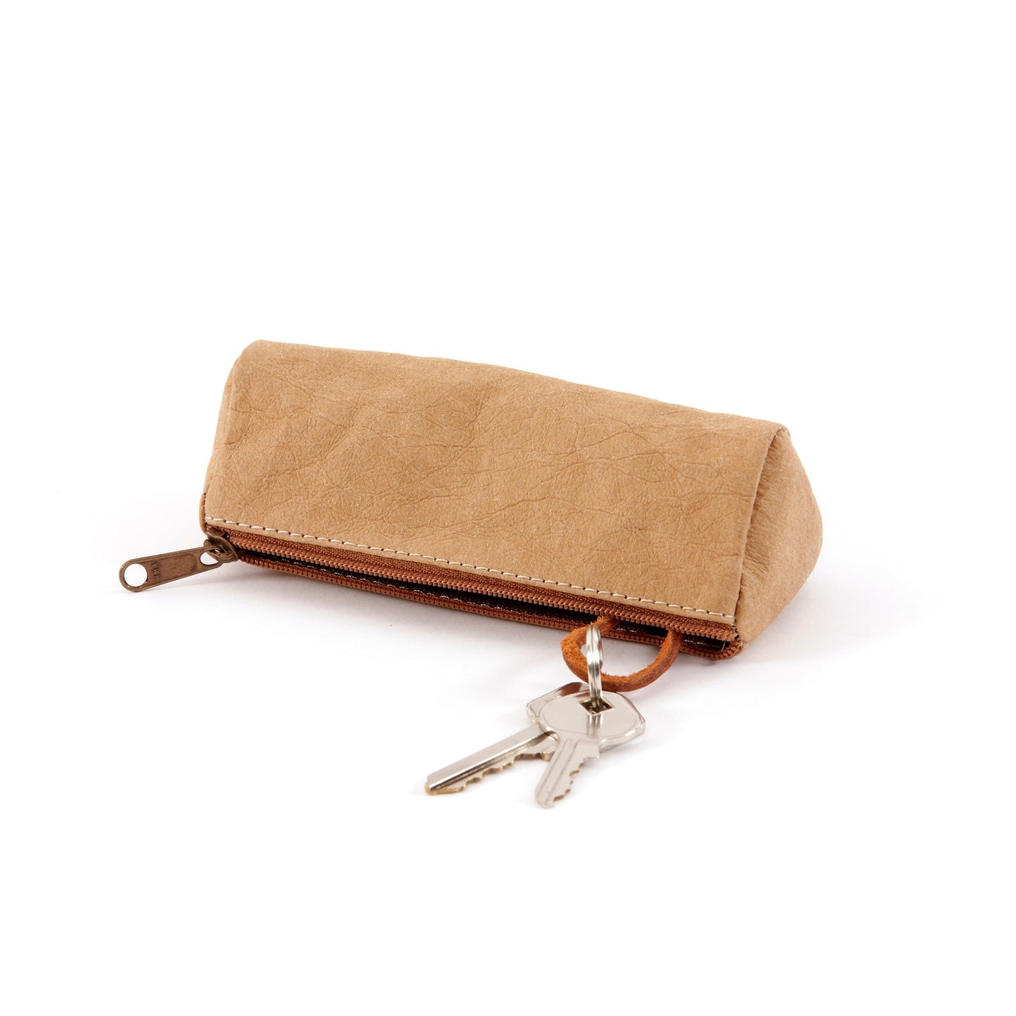 A tan washable paper key holder is shown on its side, unzipped with two keys attached to the inner ring.