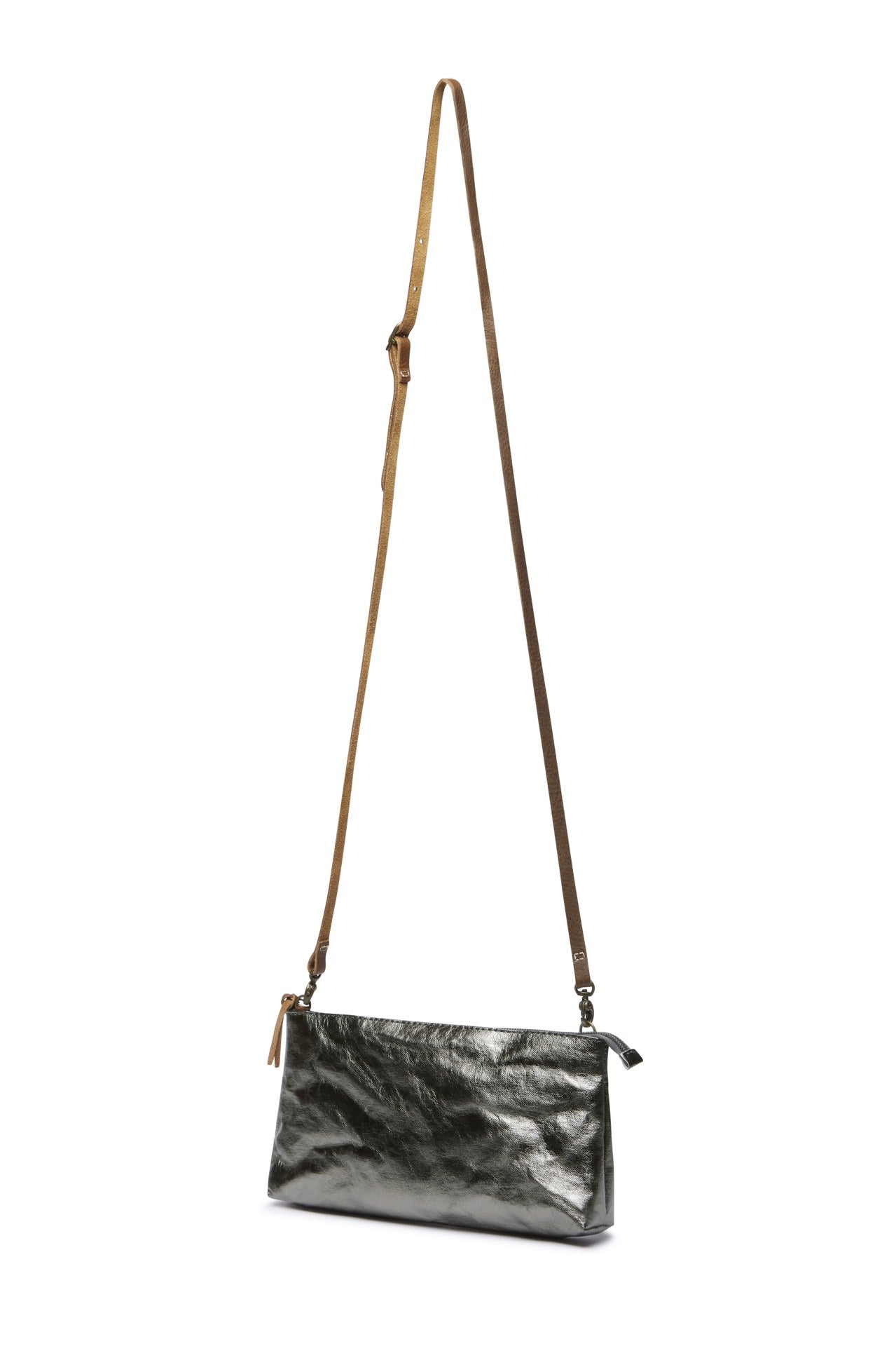 A pewter metallic washable paper small zip top handbag is shown with a long brown washable paper strap.