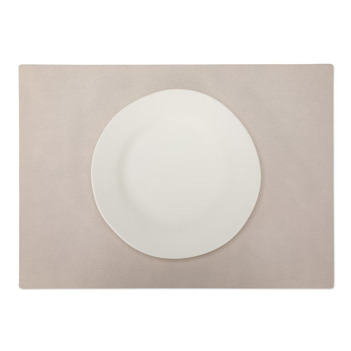 A large rectangular textured washable paper placemat in beige is shown under a white plate.