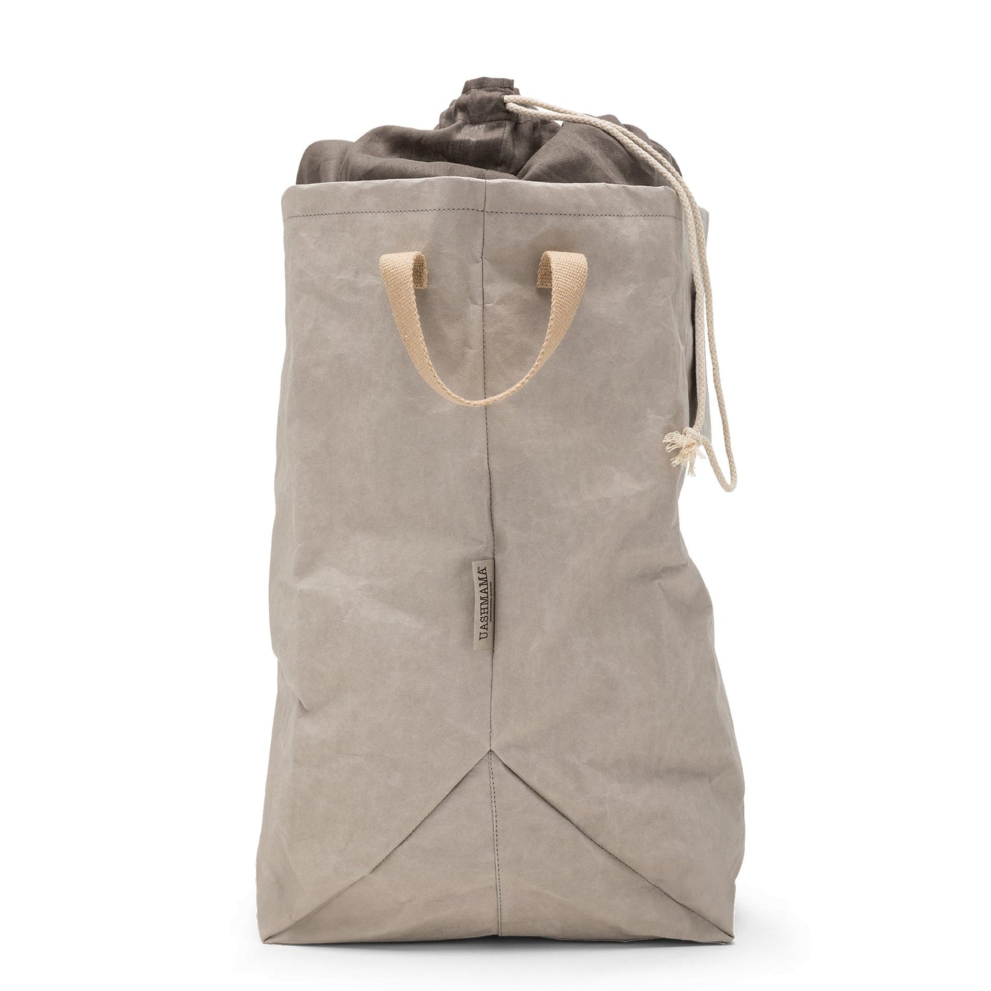 A washable paper laundry bag is shown in grey from a side angle. It features two side handles, a popper tab, and an interior drawstring lining.