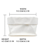 A washable paper roll-top tray is shown in white, with graphics displaying its size - 11.5cm wide x 4.5 cm high x 11.5cm deep.