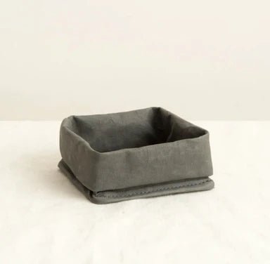 A grey roll-top washable paper tray is shown from a 3/4 angle.