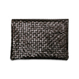 A woven washable paper clutchbag is shown from the front in chocolate brown.