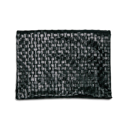 A woven washable paper clutch is shown from the front in black.