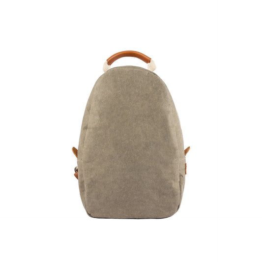 A pale khaki washable paper backpack is shown from the front. It features a top zip and a brown and canvas top handle.